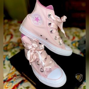 High top Chuck Taylor with ribbon shoestring.